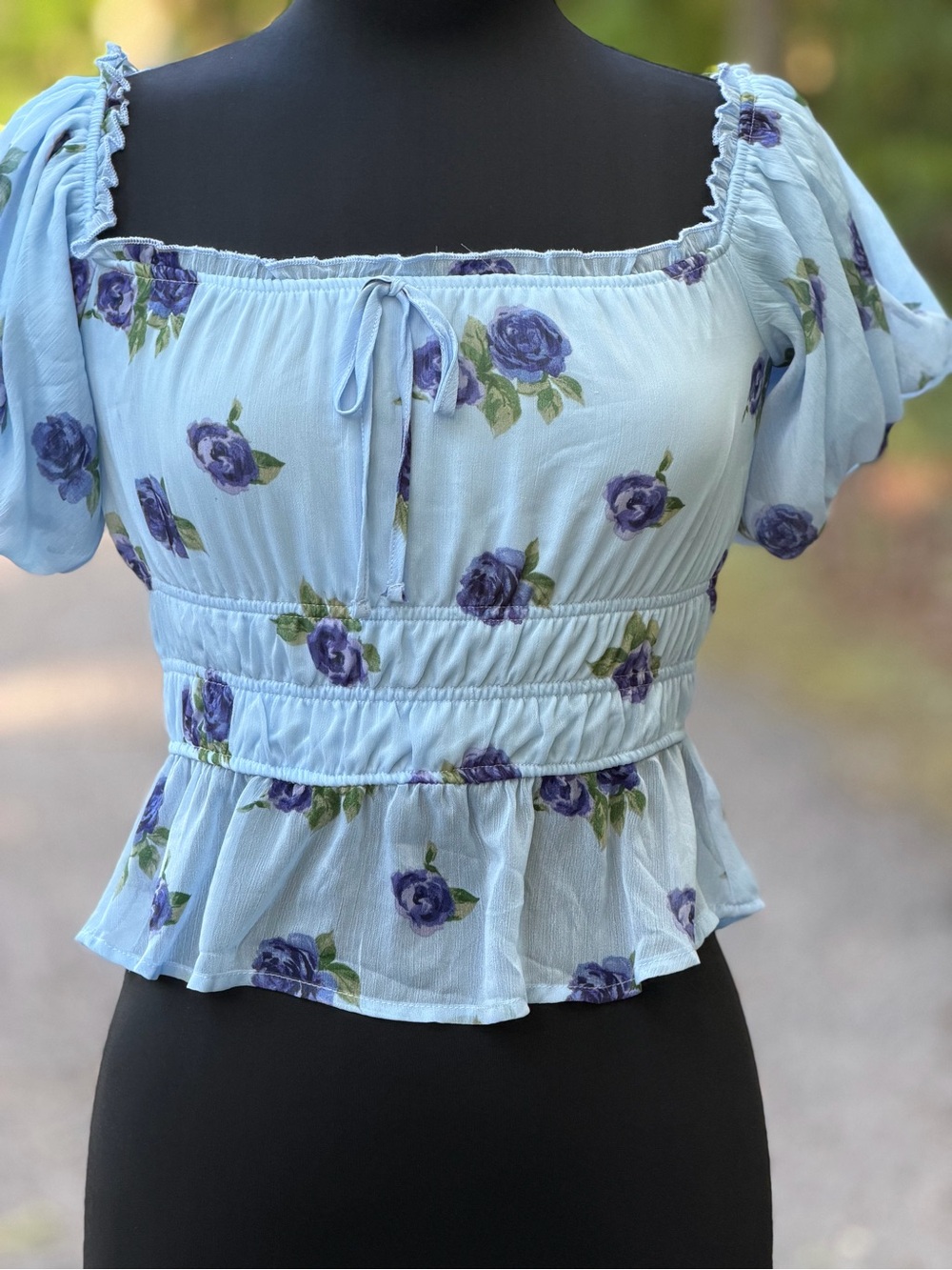 Francesca's Collections Light Blue Floral Smocked Peplum Top